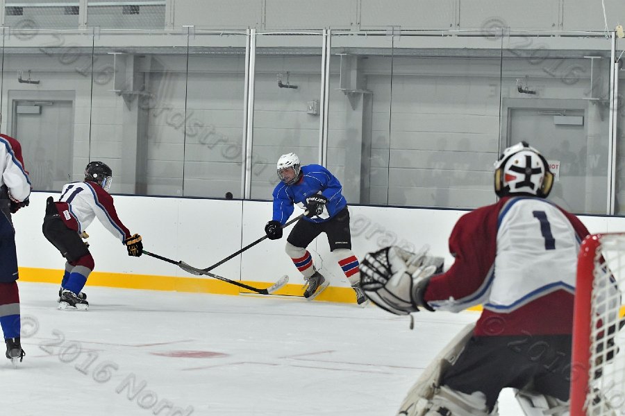 Wheaton College Men\'s Ice Hockey vs Middlesex Community College. - Photo By: KEITH NORDSTROM